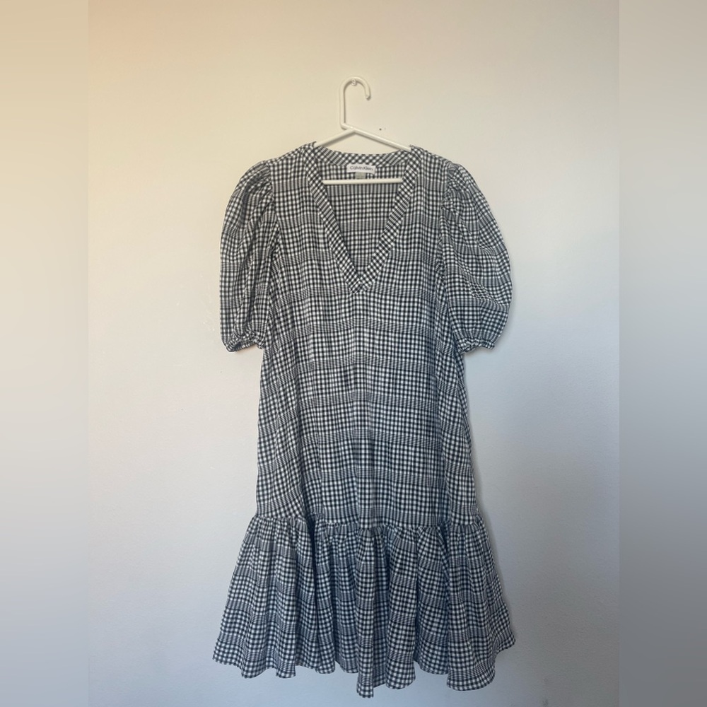 Woman’s Calvin Klein black and white graham dress with puffed sleeves